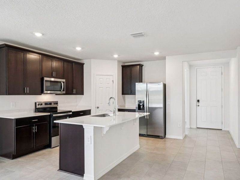 Furnished interior view inside a new home in The Meadow at Crossprairie, St. Cloud (Image 3).