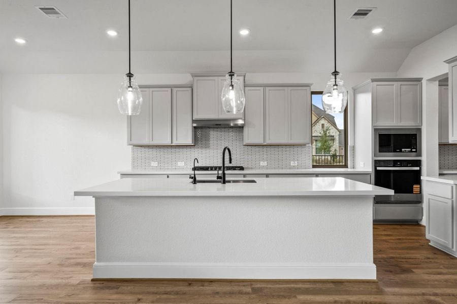 Furnished interior view inside a new home in Bridgeland 55', Cypress (Image 13).