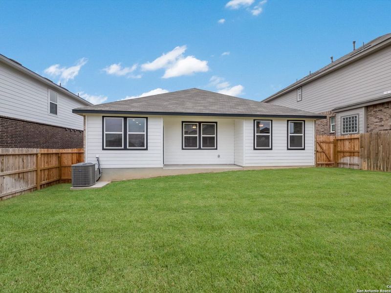 Exterior details and patio area of a home in Bricewood, San Antonio (Image 4).
