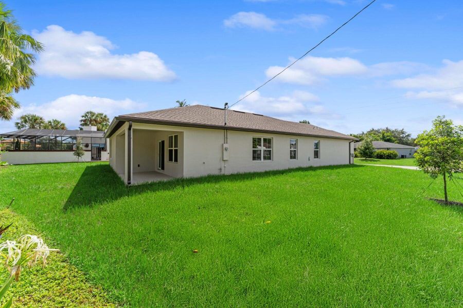 Front exterior of a new home in , Port St. Lucie, FL, highlighting curb appeal (Image 2). Front exterior of a new home in , Port St. Lucie, FL, highlighting curb appeal (Image 2).