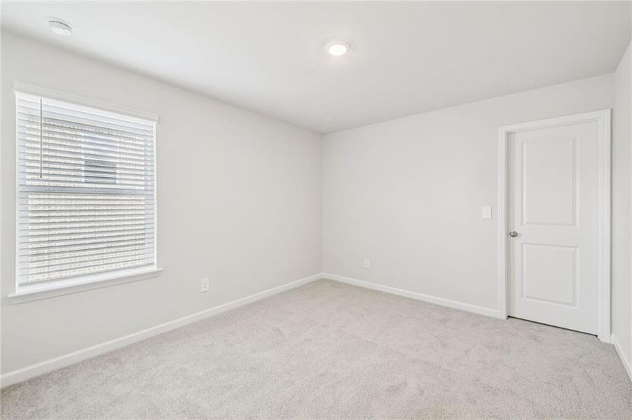 Spacious, unfurnished interior of a new home in Creekside at Oxford Park, Fairburn (Image 47).