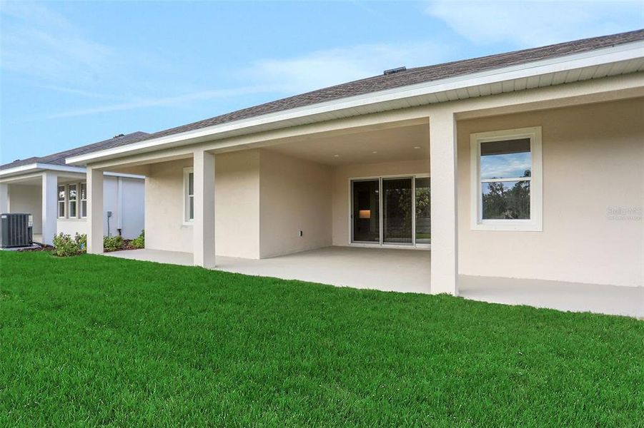 Exterior details and patio area of a home in Seaire, Parrish (Image 4).