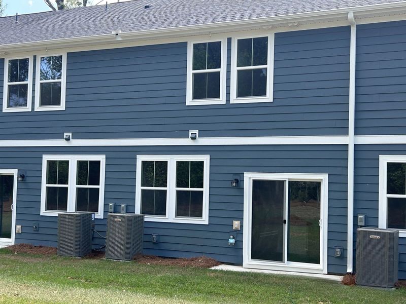 Exterior details and patio area of a home in Windward Village, Summerville (Image 3).
