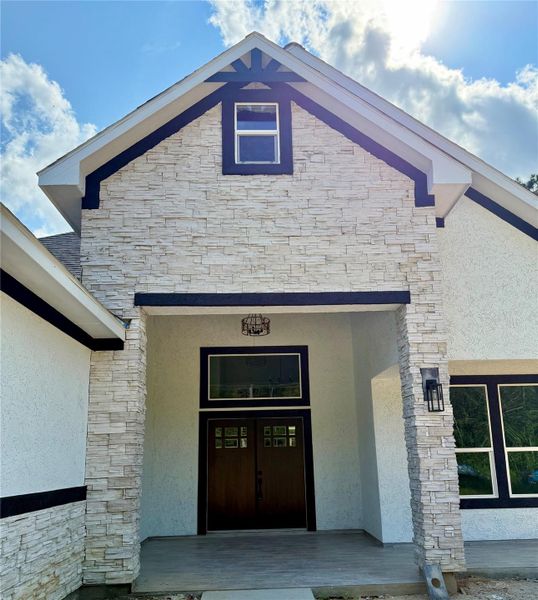 Front exterior of a new home in , Dayton, TX, highlighting curb appeal (Image 19).