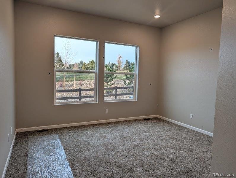 Spacious, unfurnished interior of a new home in Highlands Preserve, Mead (Image 13).