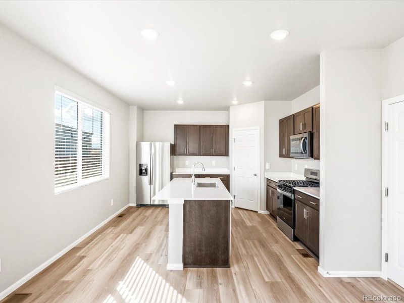 Furnished interior view inside a new home in Revere at Johnstown, Johnstown (Image 8).