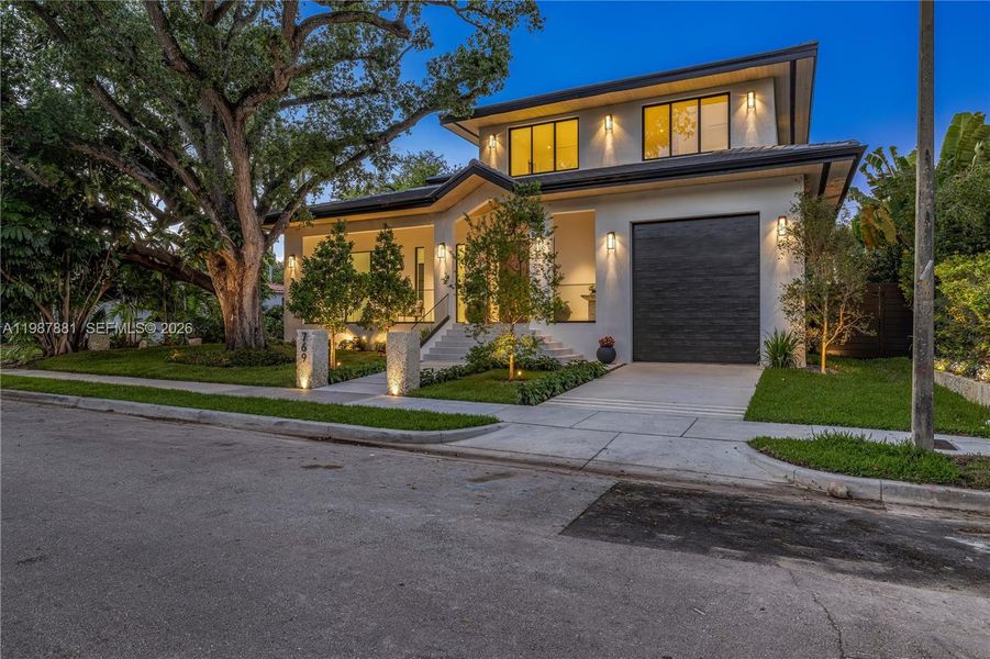 Front exterior of a new home in , Miami, FL, highlighting curb appeal (Image 28).