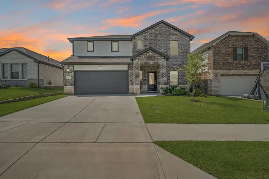 Front exterior of a new home in , Fort Worth, TX, highlighting curb appeal (Image 1). Front exterior of a new home in , Fort Worth, TX, highlighting curb appeal (Image 1).