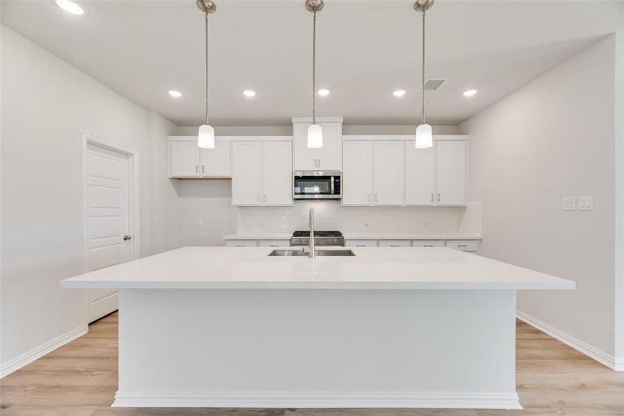 Furnished interior view inside a new home in Spiritas Ranch, Little Elm (Image 6). Furnished interior view inside a new home in Spiritas Ranch, Little Elm (Image 6).