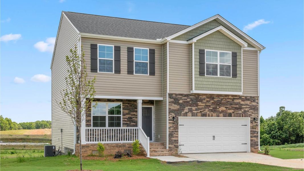Front exterior of a new home in Aurora Acres, Snow Camp, NC, highlighting curb appeal (Image 17). Front exterior of a new home in Aurora Acres, Snow Camp, NC, highlighting curb appeal (Image 17).