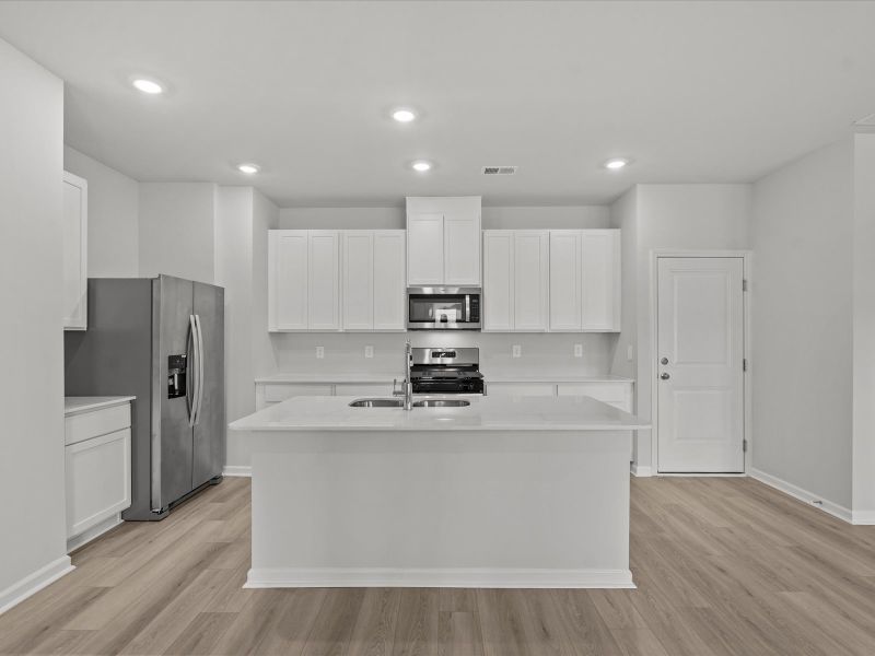 Furnished interior view inside a new home in Village at White Pine, Pendleton (Image 3).