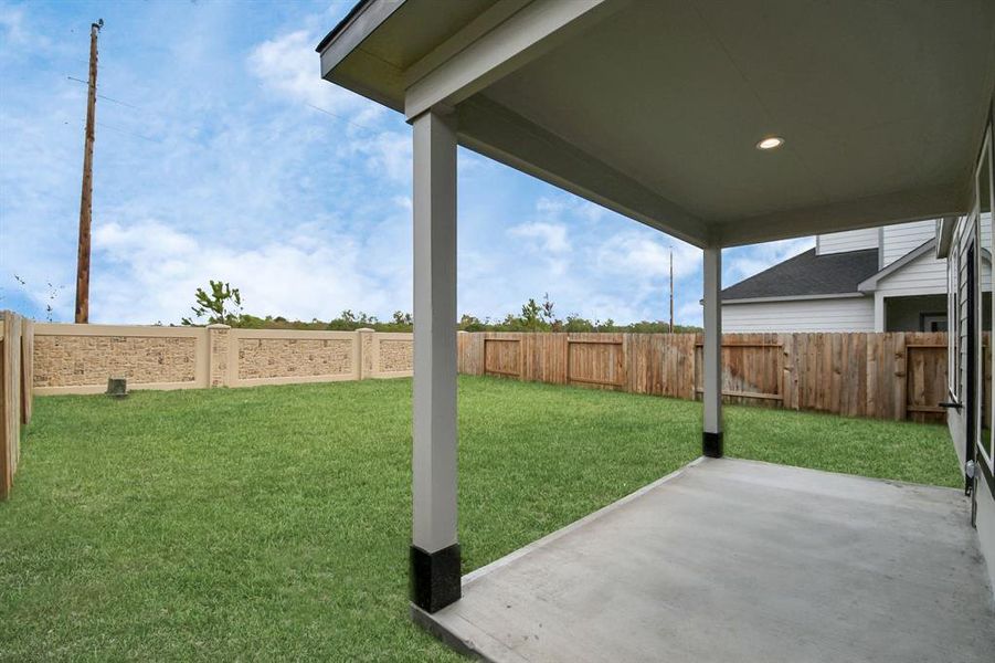 Experience outdoor living at its finest on this expansive covered patio, thoughtfully designed for BBQs and delightful outdoor dining!