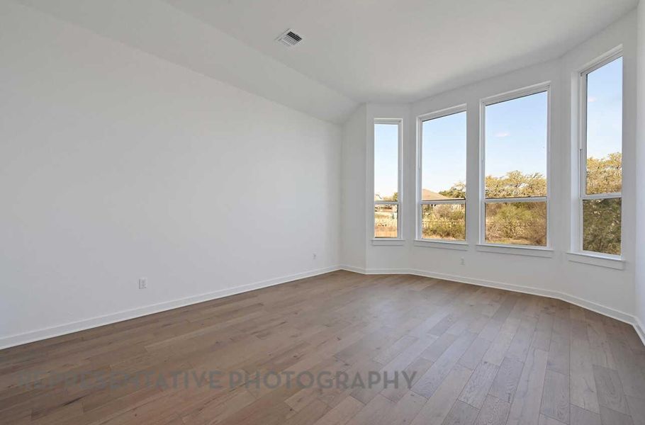 Spacious, unfurnished interior of a new home in Meridiana, Manvel (Image 8).