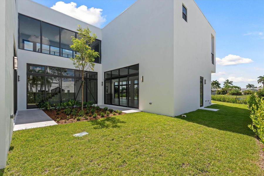 Exterior details and patio area of a home in , Weston (Image 52).
