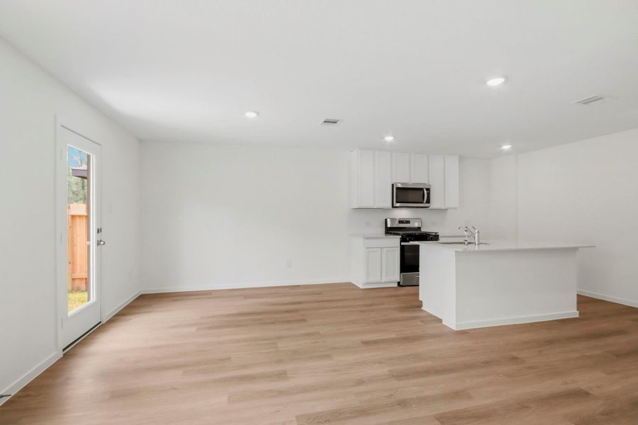 Spacious, unfurnished interior of a new home in New Waverly Station, New Waverly (Image 10). Spacious, unfurnished interior of a new home in New Waverly Station, New Waverly (Image 10).
