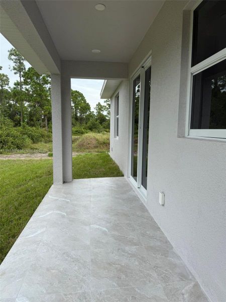 Exterior details and patio area of a home in , Lehigh Acres (Image 4). Exterior details and patio area of a home in , Lehigh Acres (Image 4).