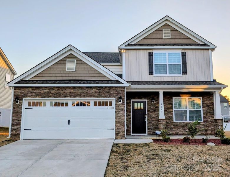 Front exterior of a new home in , Gastonia, NC, highlighting curb appeal (Image 1). Front exterior of a new home in , Gastonia, NC, highlighting curb appeal (Image 1).