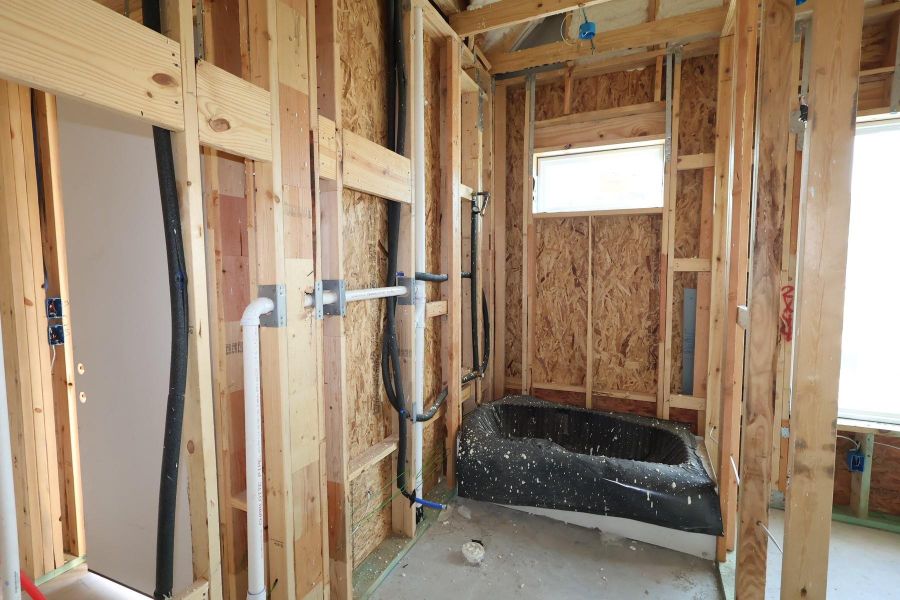 In-progress construction of a new home in Two Step Farm 42', Montgomery, TX (Image 5).