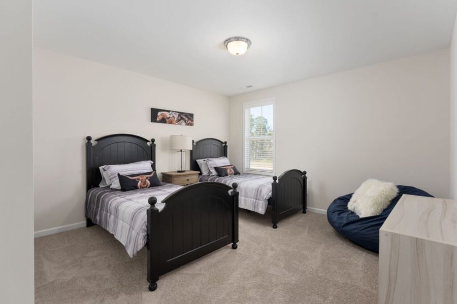 Representative furnished interior of a home built from the Naples by Stevens Fine Homes in River Tide Farms, Bolivia (Image 12).