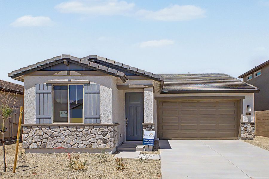 Front exterior of a new home in Frontera, Surprise, AZ, highlighting curb appeal (Image 1). Front exterior of a new home in Frontera, Surprise, AZ, highlighting curb appeal (Image 1).