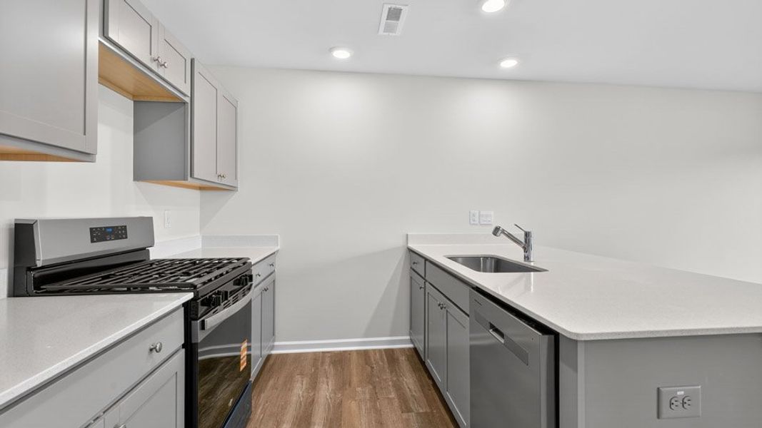Furnished interior view inside a new home in The Townes at Honeycutt Oaks, Angier (Image 7).