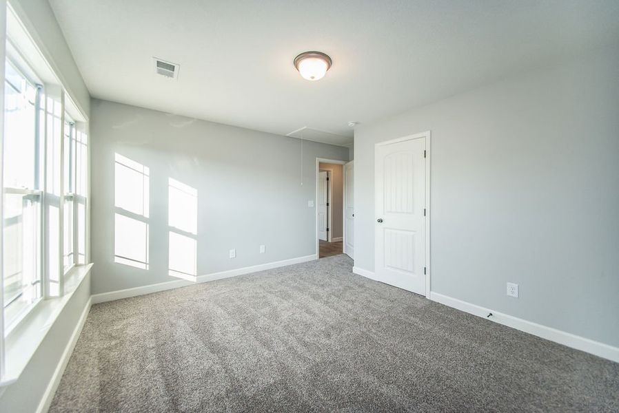 Representative unfurnished interior of a home built from the Heatherwood by Enchanted Homes in Ballentine Ridge, Lyman (Image 31).