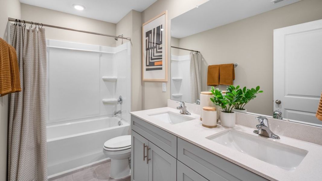 Furnished interior view inside a new home in The Preserve at Kinsley, Jamestown (Image 17).