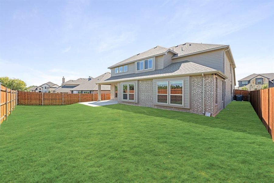 Exterior details and patio area of a home in The Grove, Midlothian (Image 17).