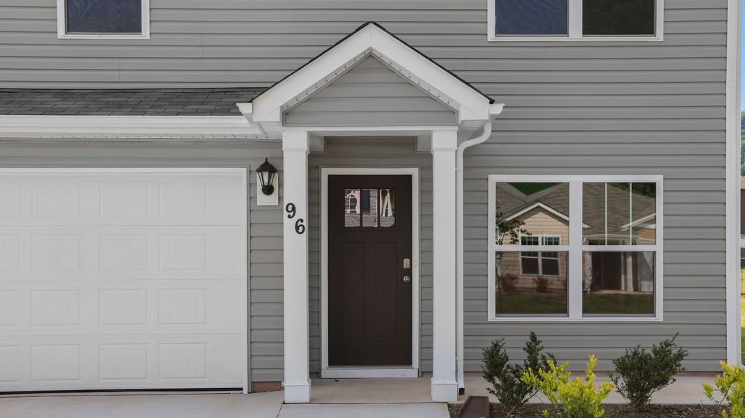 Exterior details and patio area of a home in Wildbrook Village, Waynesville (Image 3).