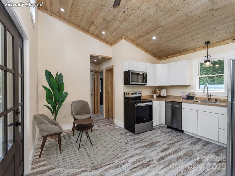 Furnished interior view inside a new home in , Waynesville (Image 13).
