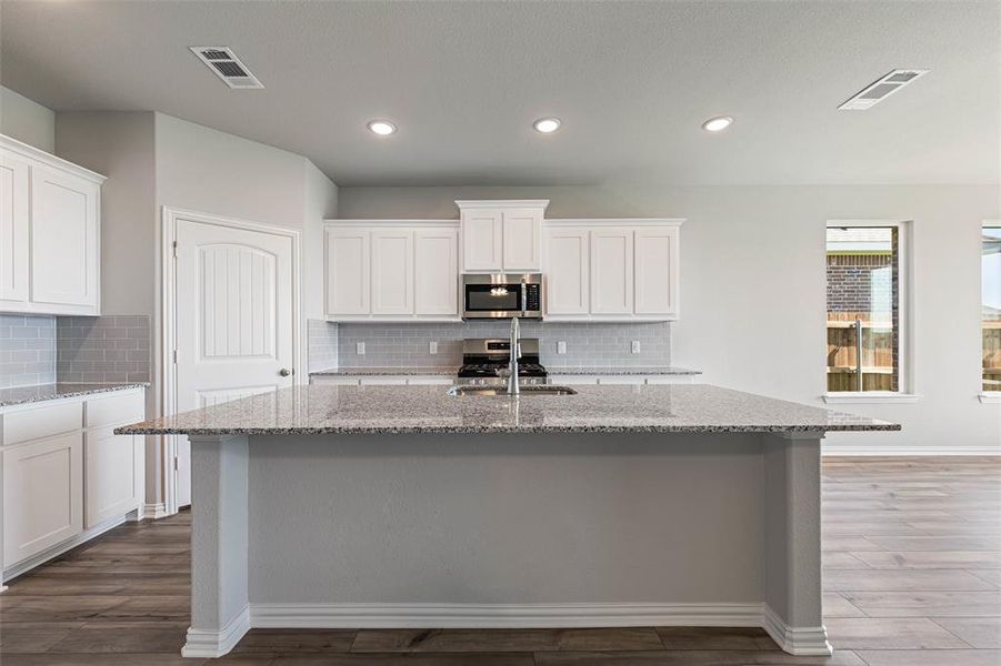 Furnished interior view inside a new home in Liberty Pointe, Gainesville (Image 9). Furnished interior view inside a new home in Liberty Pointe, Gainesville (Image 9).