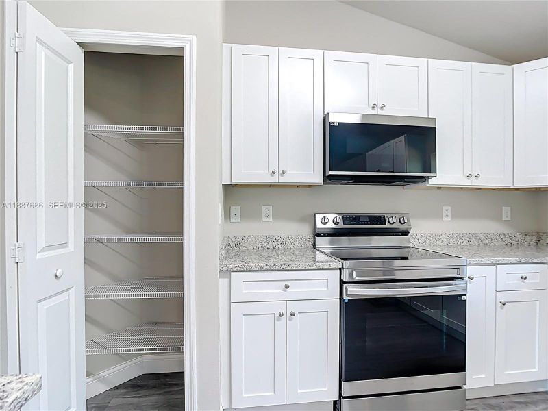 Furnished interior view inside a new home in , Port Charlotte (Image 5).