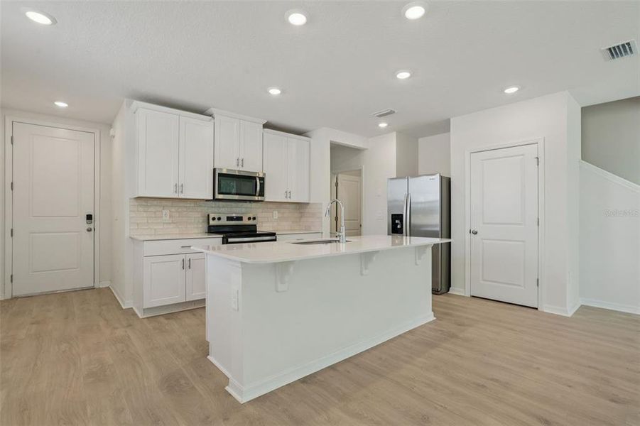 Furnished interior view inside a new home in Bradford Park, Ormond Beach (Image 10).