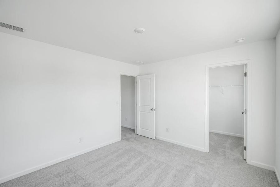 Spacious, unfurnished interior of a new home in Heritage River, Euharlee (Image 28).