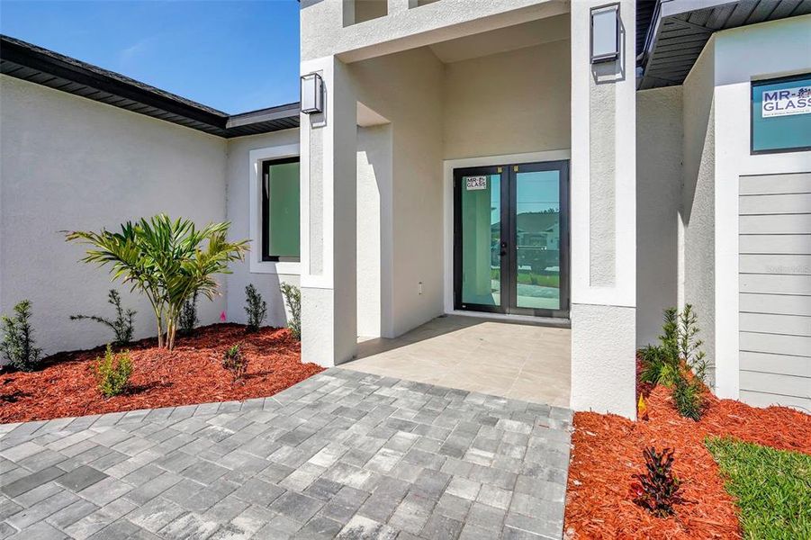 Front exterior of a new home in , Rotonda West, FL, highlighting curb appeal (Image 27).