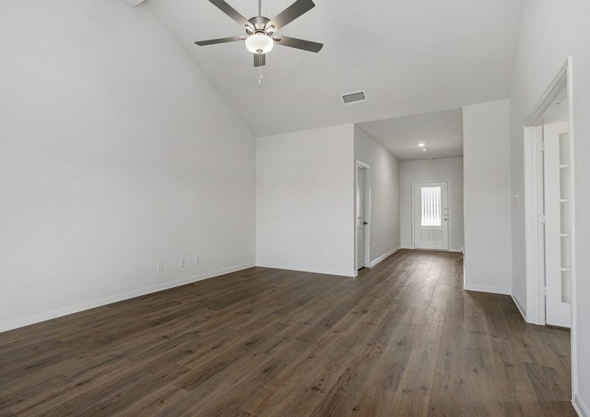 The living room has plenty of room for lots of furniture.