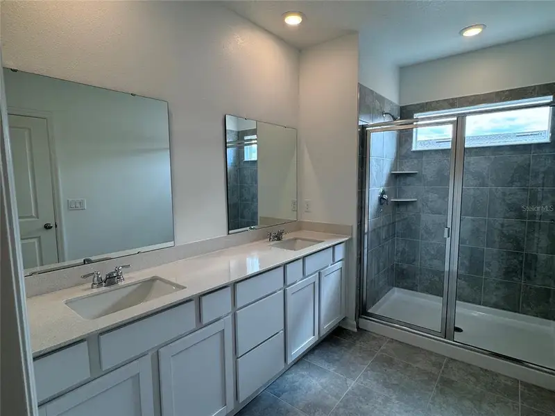 Furnished interior view inside a new home in , Kissimmee (Image 9).