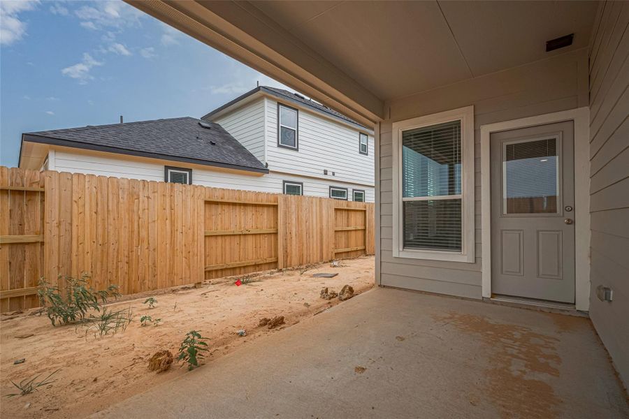Exterior details and patio area of a home in , Brookshire (Image 3).