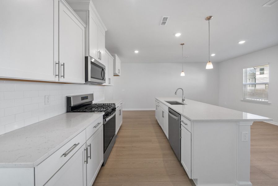Furnished interior view inside a new home in Huxley, Apex (Image 4).
