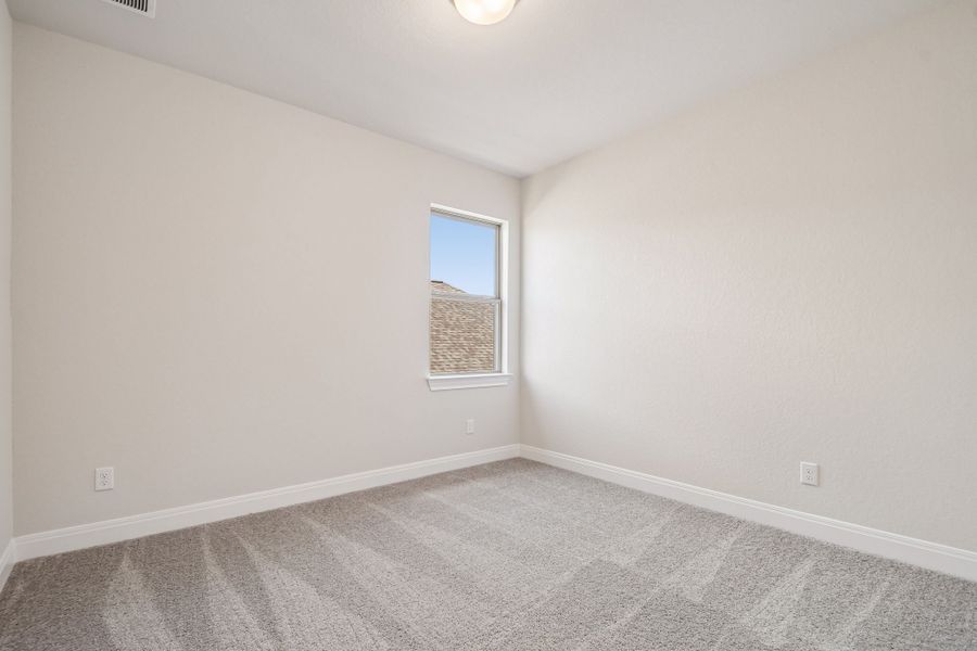 Spacious, unfurnished interior of a new home in 6 Creeks, Kyle (Image 32).
