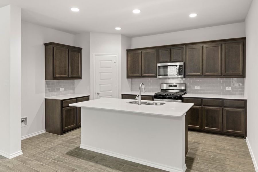 Representative exterior photo of a completed home built from the Hickory by Impression Homes in Northspur, Terrell, TX (Image 7). Representative exterior photo of a completed home built from the Hickory by Impression Homes in Northspur, Terrell, TX (Image 7).