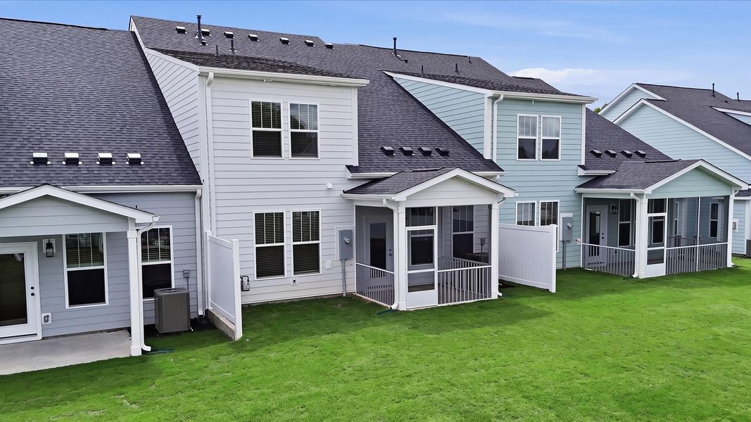 Superior curb appeal continues to the back with a refined, covered outdoor living space at Village at Midway Superior curb appeal continues to the back with a refined, covered outdoor living space at Village at Midway