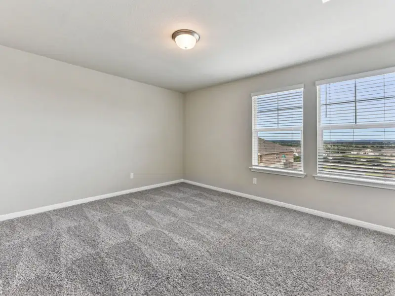 Spacious, unfurnished interior of a new home in Big Sky Ranch - Executive Collection, Dripping Springs (Image 18). Spacious, unfurnished interior of a new home in Big Sky Ranch - Executive Collection, Dripping Springs (Image 18).
