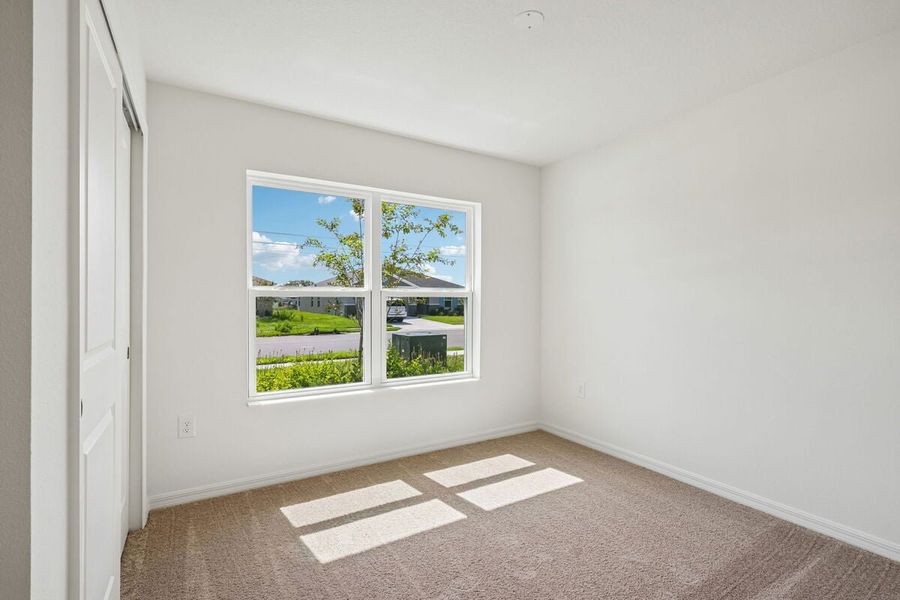 Spacious, unfurnished interior of a new home in The Preserve at Legends Pointe II, Hudson (Image 9).