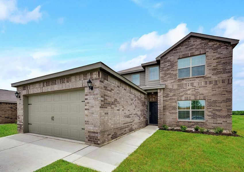 The Oakmont has a covered front entryway and professional front yard landscaping.