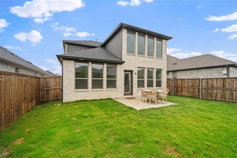 Exterior details and patio area of a home in Eastridge, McKinney (Image 3).