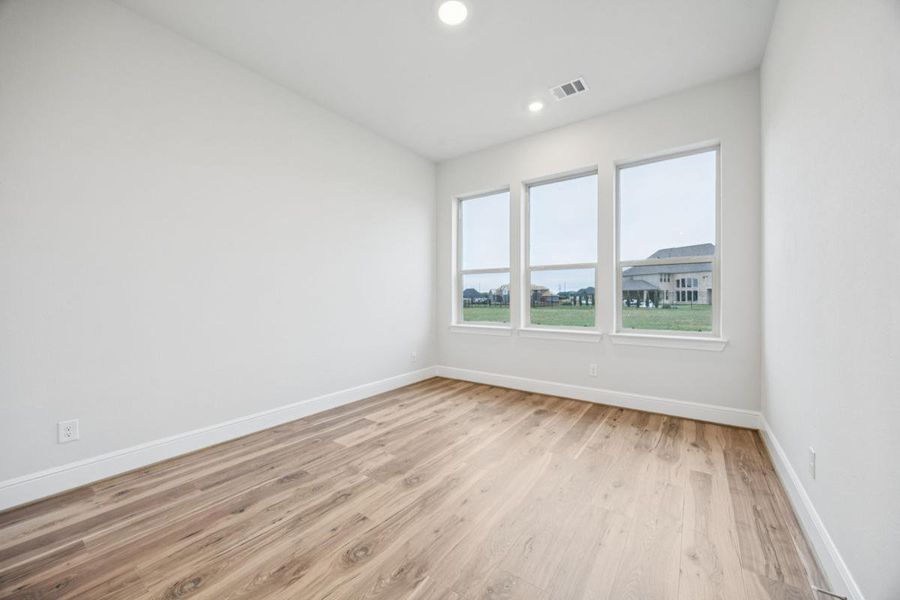 Representative unfurnished interior of a home built from the Grand Maison III by Grand Homes in Kings Crossing, Parker (Image 20).