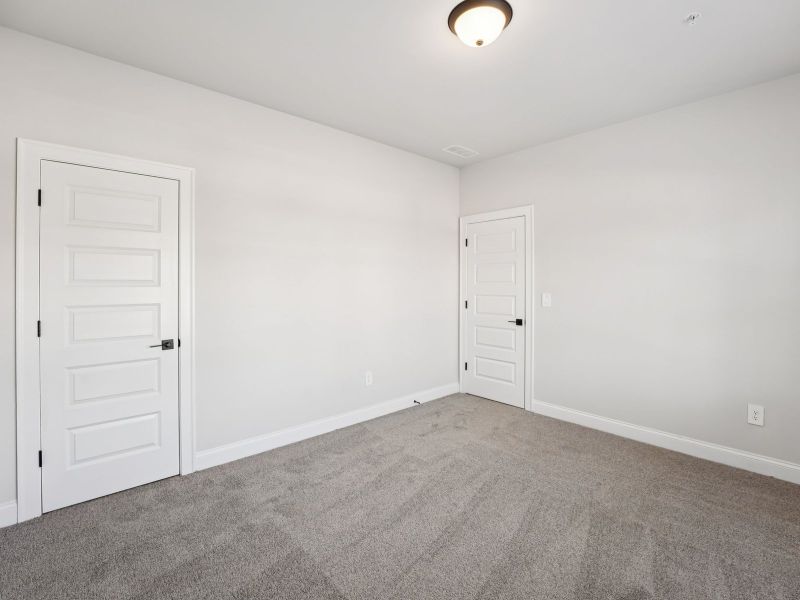 Spacious, unfurnished interior of a new home in Hemingway - Highland Series, Cumming (Image 16).