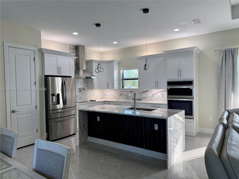 Furnished interior view inside a new home in , Lehigh Acres (Image 6).