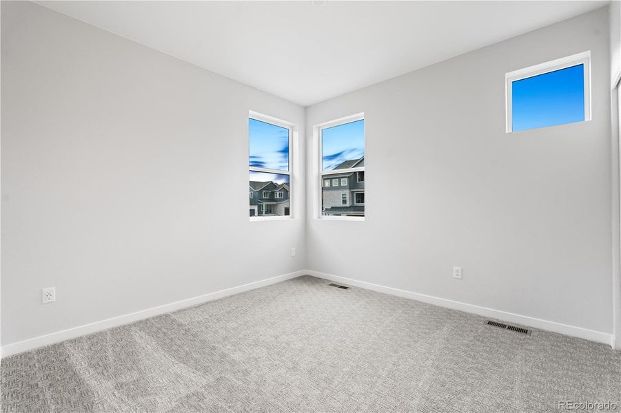 Spacious, unfurnished interior of a new home in Tribute at Lyric, Lone Tree (Image 20).